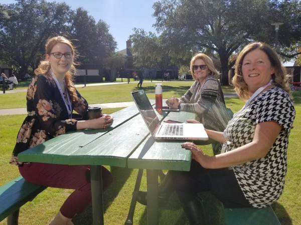 AONN+ members sitting at a park