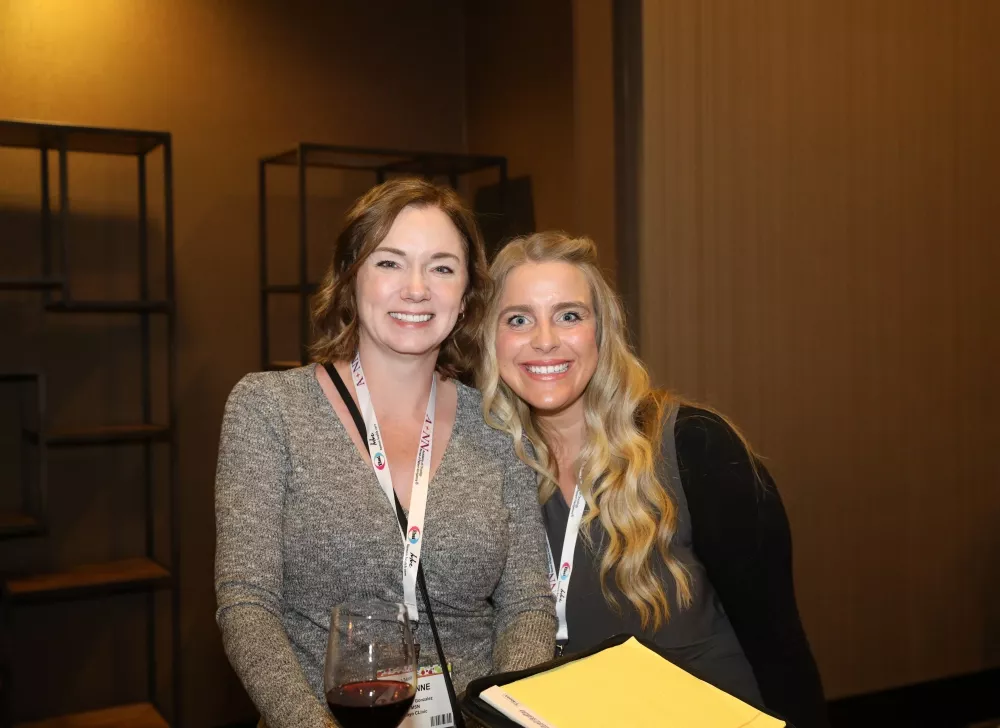 Smiling conference attendees