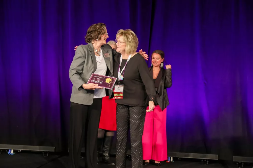 Receiving their award